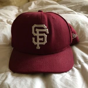 San Francisco Giants baseball hat.
